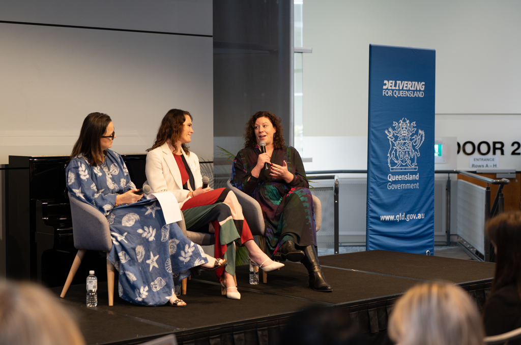 Three women on stage at the Annual Forum
