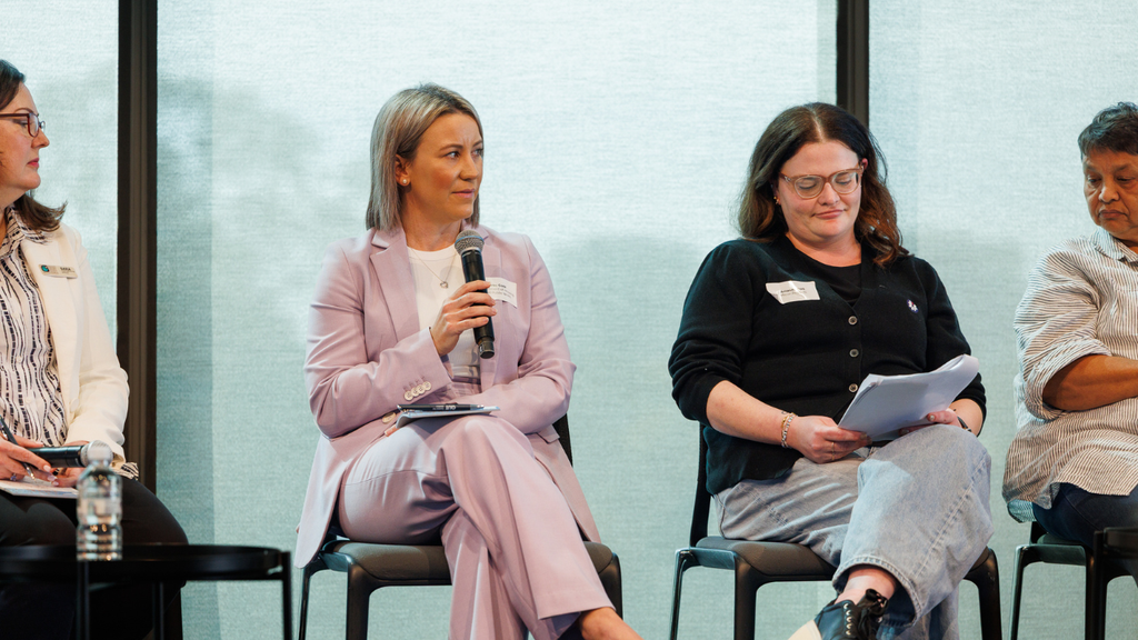 Kirby Cook speaking on a panel at the Annual Forum